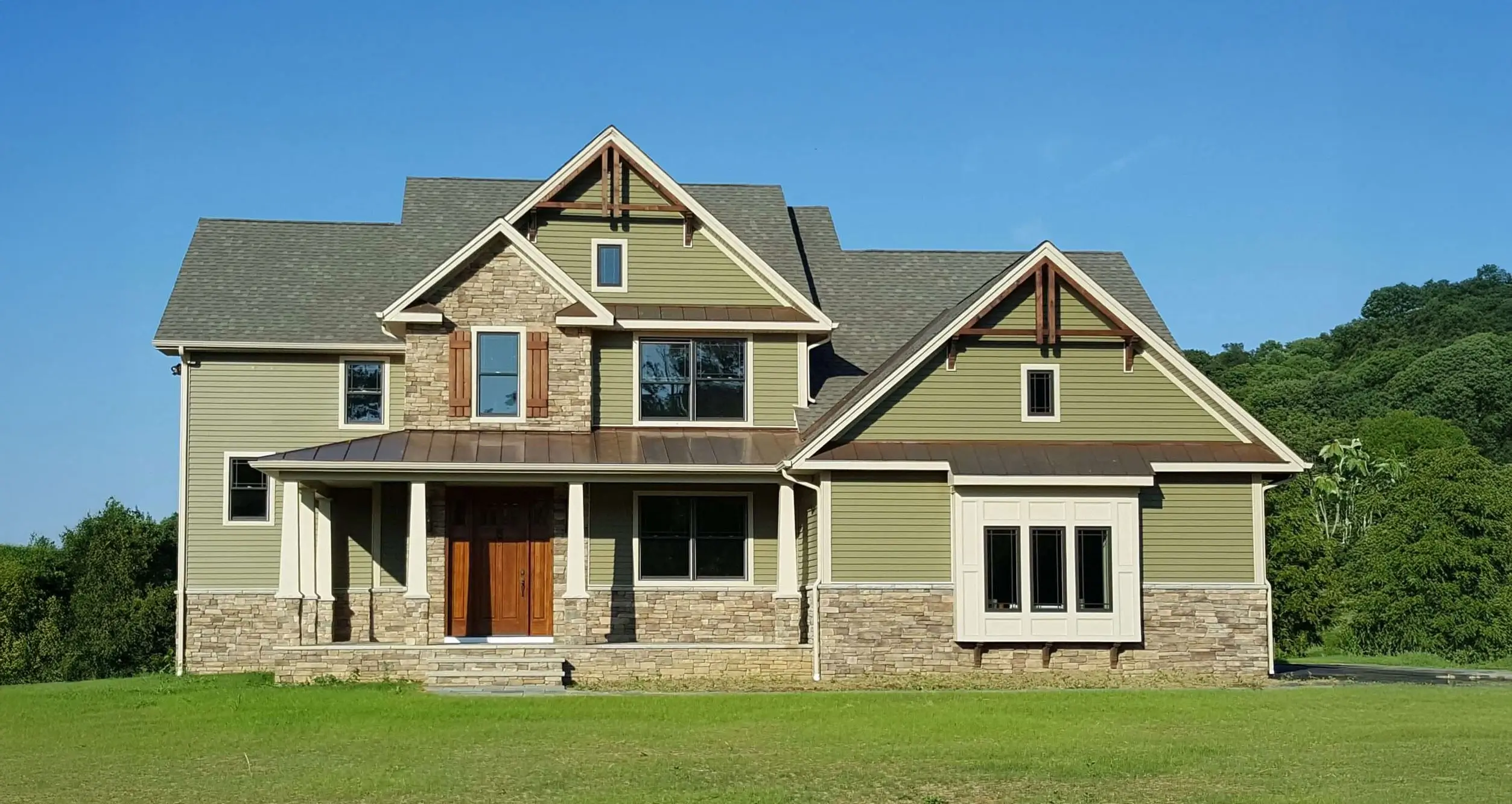 Choosing the Right Roofing Material for Your Home: Asphalt, Metal, Slate, or Cedar?